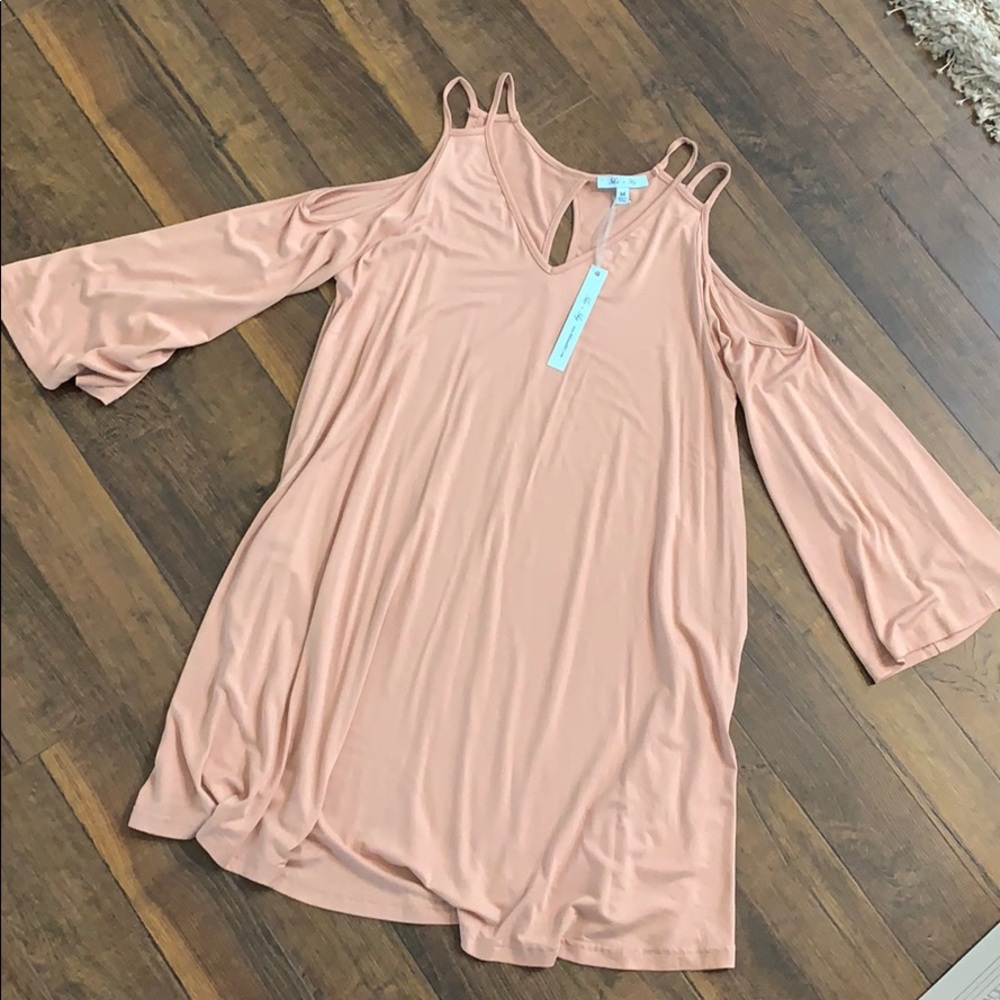 Long sleeve but open on the shoulder dress